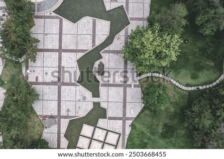 Image, Stock Photo Aerial perspective at a single tree and a crossing little river in a winter snowy top view.