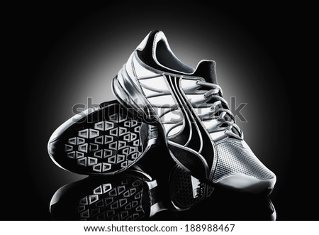 Athletic shoe on black background