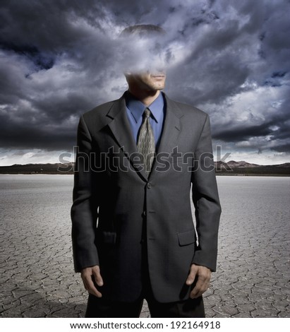 Digital composite of a man with his head in the clouds
