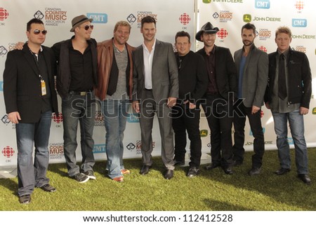 SASKATOON, CANADA - SEPT 9:  Emerson Drive and Doc Walker arriving at the 2012 Canadian Country Music Association Awards at Credit Union Centre on September 9, 2012 in Saskatoon, Canada