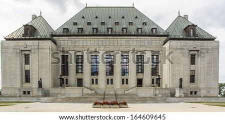 The Supreme Court Building is a massive granite building whose design is clearly rooted in the classical tradition
