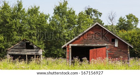 Abandoned farm buildings with weathered wood
