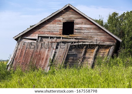 Abandoned farm building with weathered wood