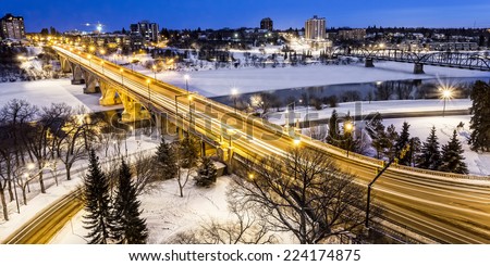 The Broadway Bridge and South Saskatchewan River in Saskatoon, Canada on a cold winter night.