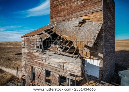 Similar – Image, Stock Photo Dilapidated old buildings in mountain desert under cloudy sky