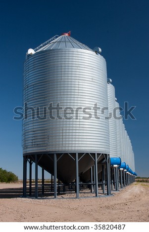 A line of steel grain bins.