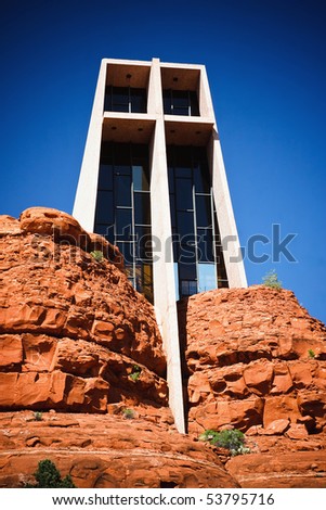 The Chapel of the Holy Cross is an iconic Catholic chapel built into the mesas of Sedona, Arizona.  It is built directly into a butte and offers a spectacular view of the valley below.