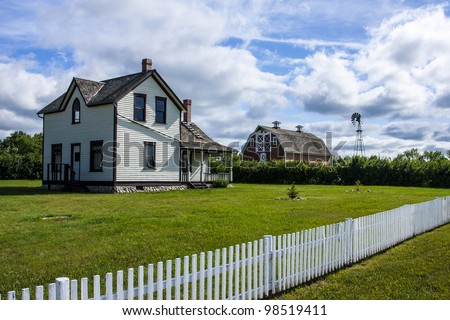 Old farm yard with the house and red barn Stock foto © 