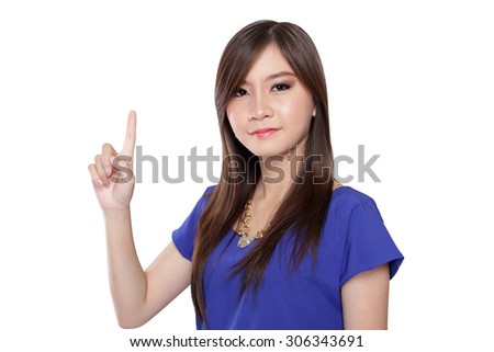 Gorgeous Asian girl looked forward. She point her index finger to the top confidently, isolated on white background.