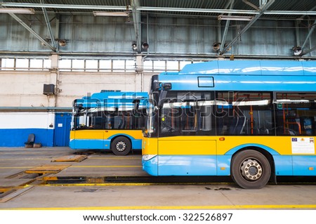 Sofia, Bulgaria, September 14, 2015 - Skoda Solaris trolleybuses, part of the city public transport network,are seen parked in the trolley and bus depot and workshop during line pause.