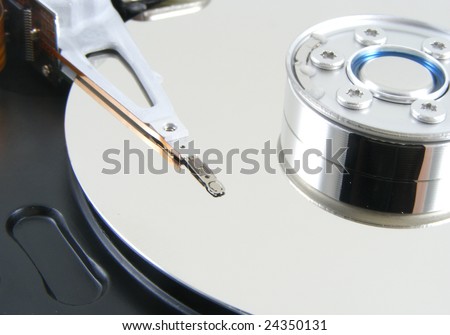 Hard drive, case removed to show disk & read/write head