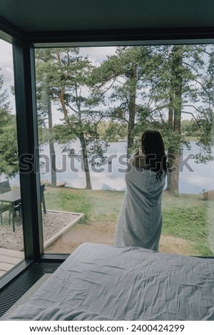 Similar – Image, Stock Photo Unrecognizable woman near forest river