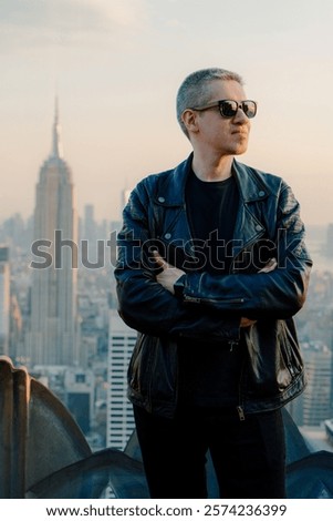 Similar – Image, Stock Photo Stylish dreamy man standing on rough brick wall