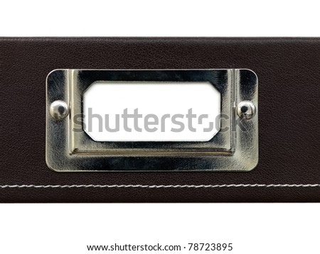 An office tray label on a leather tray