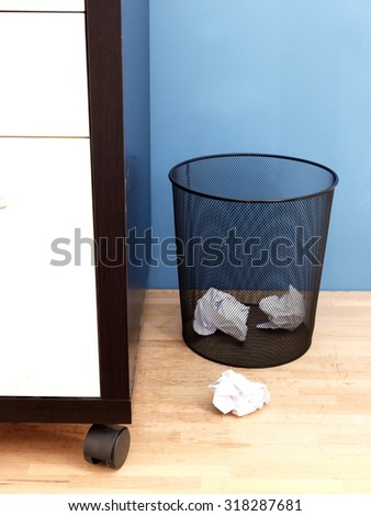 A close up shot of a trash can