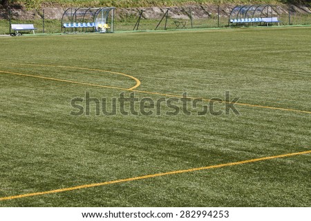 a football pitch with yellow lines