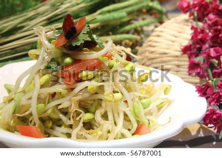Chinese food dish,Main ingredient of the bean sprouts, soybeans, cucumbers, tomatoes,. Vinegar.