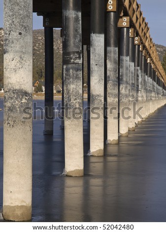 frozen water around a small pedestrian bridge,big bear lake,california,december 2009.