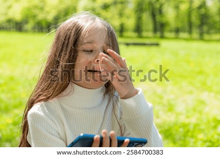 Similar – Image, Stock Photo Unhappy girl playing video game in evening time