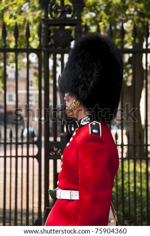 LONDON, UK - APRIL 20: A royal guard outside Clarence House where Prince William will spend the night before the royal wedding to be held on Friday 29th April, April 20, 2011 in London, United Kingdom