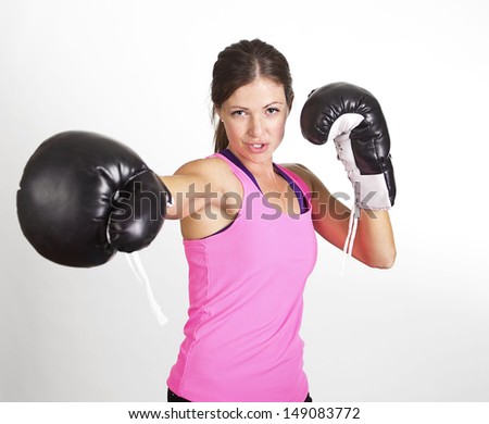 Woman Boxing At A Gym. Strong, Fit Woman In Action Stock Photo ...