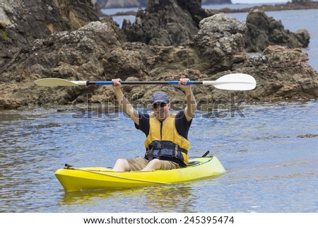 Man enjoying an ocean kayaking trip
