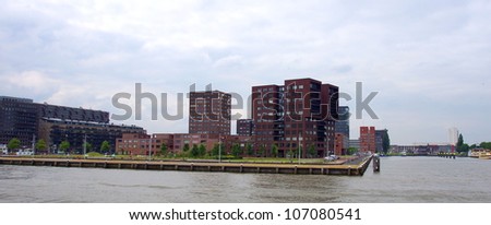buildings  by  the riverside of the maas river at the city of Rotterdam, in the Netherlands