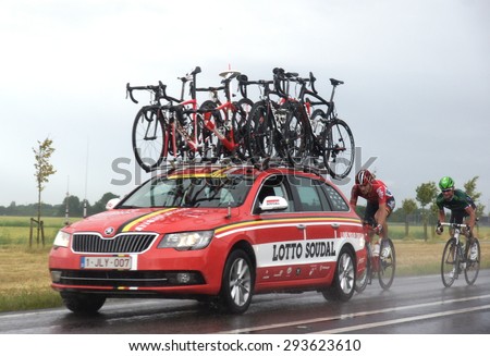 ROTTERDAM-JULY 5: Cyclists from various teams cycle in heavy showers of rain during Stage 2 of the Tour de France from Utrecht to  Zelande  on July 5 2015 in Rotterdam, Netherlands
