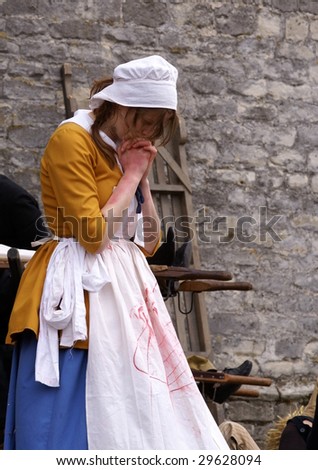 BERGEN OP ZOOM, NETHERLANDS - MAY 2 : Actress reenacts the Capture of Bergen op Zoom in 1747 by the French army May 2, 2009 in Bergen op Zoom. After seventy days of battle, the city was taken.
