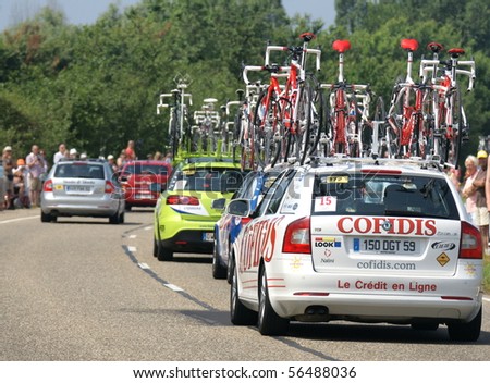 ROTTERDAM-JULY 4: Cars from various teams drive on during Stage 1 of the Tour de France from Rotterdam to Brussel on July 4 2010 in Rotterdam, Netherlands