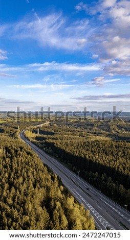 Similar – Man photographing landscape from observation deck