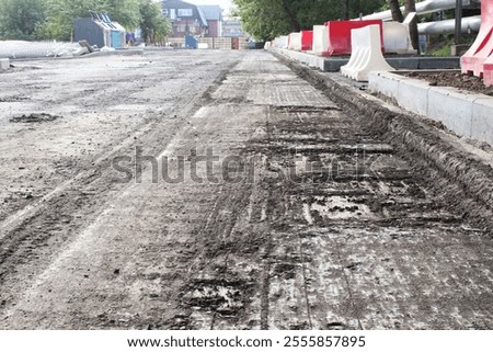 Similar – Image, Stock Photo A barrier and footprints in the slush