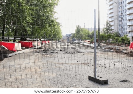 Similar – Image, Stock Photo Red white barrier chain disappears in green hedge