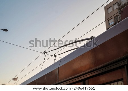 Similar – Image, Stock Photo Overhead Power Pole with High Voltage Lines against a Blue Sky with Sheep Clouds / Power Pole / Energy