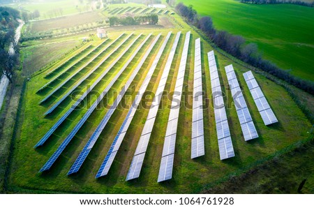 Similar – Foto Bild Solarenergie-Farm. Hochformatige Ansicht von Solarmodulen in einem Energiepark