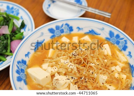 Home cooked Chinese vegetarian bean curd cuisine. Ingredients include bean curd and mushrooms. Suitable for food and beverage, healthy eating and lifestyle, and diet and nutrition.
