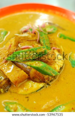 Chinese vegetarian fish curry cuisine. Ingredients include lady fingers and tomatoes. Suitable for food and beverage, healthy lifestyle, and diet and nutrition.
