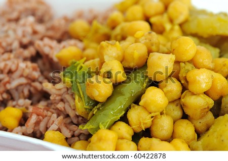 Healthy Indian vegetarian set meal with unpolished red rice. Concepts such as food and beverage, and travel and cuisine, and diet and nutrition.