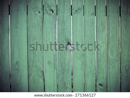 Wooden fence. Wooden fence painted in green color.