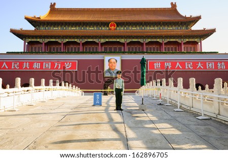 Beijing - May 30, 2012: A Chinese soldier in front of the Tiananmen Gate of Heavenly Peace.Tiananmen Gate is not only the famous ancient Chinese architecture,also the landmark of Beijing
