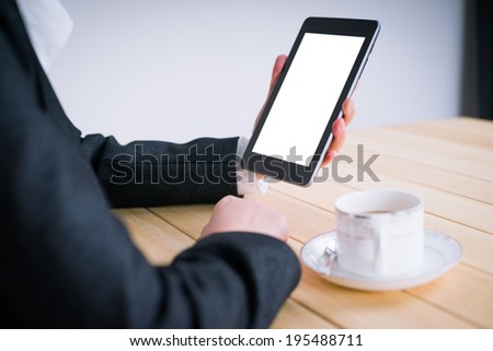 business woman reading information with tablet PC