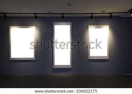 art exhibition with picture frame and spotlight