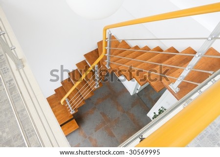 the wooden staircase in the house