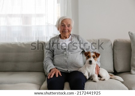 Similar – Foto Bild Frau mit Jack-Russell-Terrier-Welpen im Freien. Beziehungen und Tierpflegekonzept