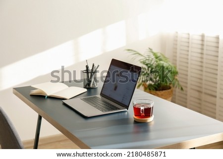 Similar – Image, Stock Photo Notebook on desk with keyboard in home office