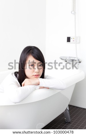 attractive asian woman in the bath room