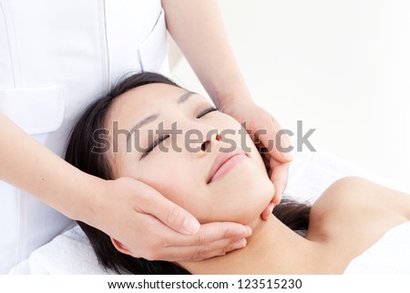 attractive asian woman skin care image on white background
