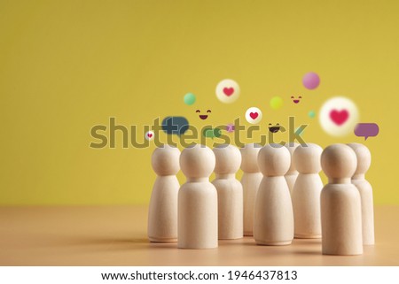 Psychology Personality Concept. Extrovert Person. person who Happy and Enjoy by Talking, Interaction, Party Often. presenting by wooden peg dolls Foto stock © 