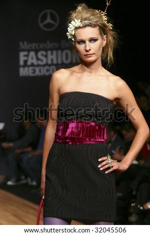MEXICO CITY - MAY 18: A model walks the runway wearing Blanca Estela Sanchez Autumn/Winter 2009 during Mercedes-Benz Fashion Mexico Autum/Winter 2009 May 18, 2009 in Mexico City.