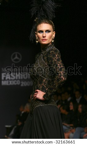 MEXICO CITY - MAY 18: A model walks the runway wearing Pedro Loredo Autumn/Winter 2009 during Mercedes-Benz Fashion Mexico Autum/Winter 2009 May 18, 2009 in Mexico City.